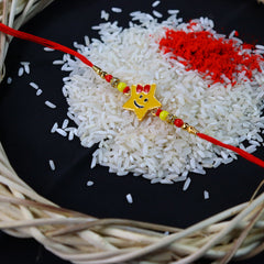 Smily Star Shape Kids Rakhi With Effete Magic Chocolate 32Gm With Pooja Thali ,Silver Color Pooja Coin, Roli Chawal & Greeting Card