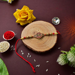 Round Traditional Rakhi With Red Mina Work With Ganesha Pooja Thali Set ,Silver Color Pooja Coin, Roli Chawal & Greeting Card