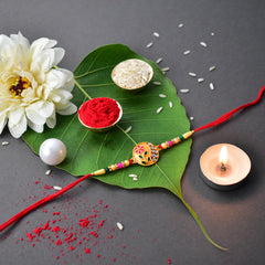 Flower Diamond Rakhi With Red And Green Mina With Square Pooja Thali Set ,Silver Color Pooja Coin, Roli Chawal & Greeting Card