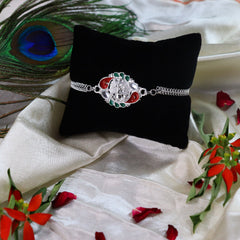 Traditional Square And Ganesh Mina Silver Color Rakhi With Decorative Gift 4Pc Diya Set ,Silver Color Pooja Coin, Roli Chawal & Greeting Card