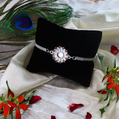 Silver Flower And Bro Swag Rakhi With Decorative Gift 4Pc Diya Set ,Silver Color Pooja Coin, Roli Chawal & Greeting Card