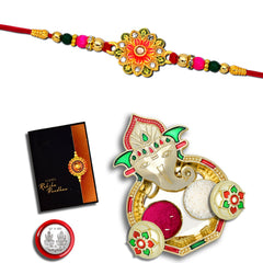 Green And Red Flower Rakhi With Ganesha Pooja Thali Set ,Silver Color Pooja Coin, Roli Chawal & Greeting Card