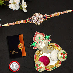 Flower Diamond Rakhi With Red And Blue Mina With Ganesha Pooja Thali Set ,Silver Color Pooja Coin, Roli Chawal & Greeting Card