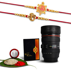 Ganesh And Turtle Golden Color 2 Rakhi With Coffee Camera Lens Mug With Coffee Camera Lense Mug ,Silver Color Pooja Coin, Roli Chawal & Greeting Card