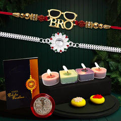 Silver Flower And Bro Swag Rakhi With Decorative Gift 4Pc Diya Set ,Silver Color Pooja Coin, Roli Chawal & Greeting Card