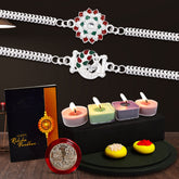 Flower And Mor Silver Color Rakhi With Decorative Gift 4Pc Diya Set ,Silver Color Pooja Coin, Roli Chawal & Greeting Card