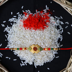 Om Design With Colorful Beads With Effete Butterscotch Chocolate 32Gm ,Silver Color Pooja Coin, Roli Chawal & Greeting Card