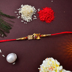 Om Rakhi With Diamond And Traditional Rakhi In Round Shape With Decorative Baby Buddha Gift ,Silver Color Pooja Coin, Roli Chawal & Greeting Card