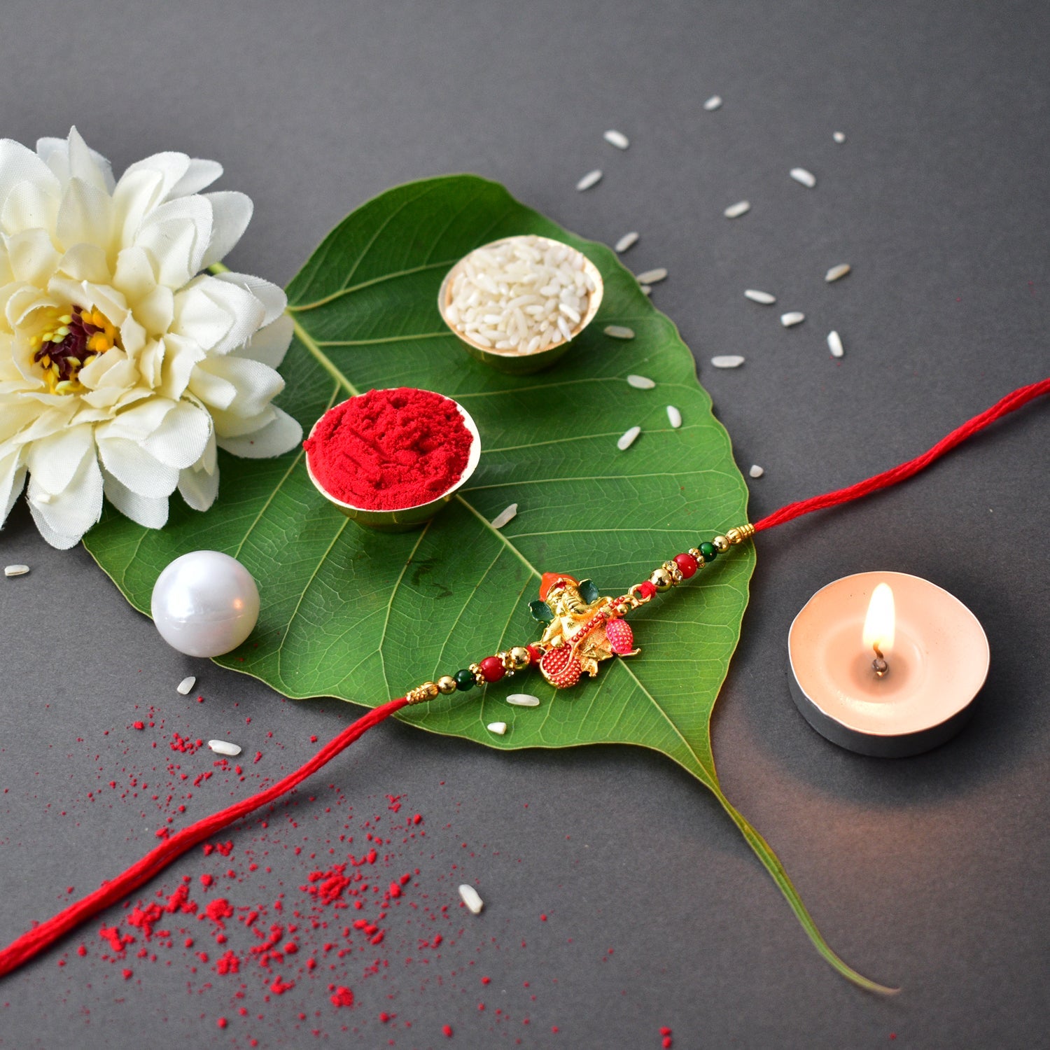 Diamond Rakhi With Red Mina Work With Square Pooja Thali Set ,Silver Color Pooja Coin, Roli Chawal & Greeting Card