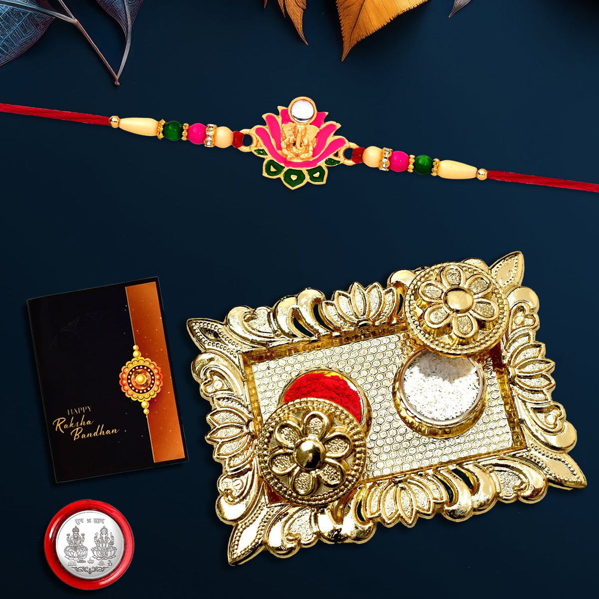 Ganesh In Kamal Flower Rakhi With Square Pooja Thali Set ,Silver Color Pooja Coin, Roli Chawal & Greeting Card