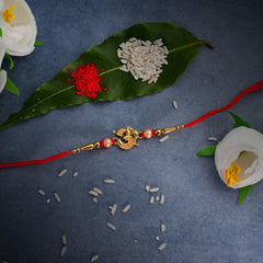 Om Golden Color Rakhi With Diamonds With Coffee Camera Lense Mug ,Silver Color Pooja Coin, Roli Chawal & Greeting Card
