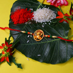 Ganesh Golden Color Rakhi And Silver Flower Rakhi With Decorative Gift 4Pc Diya Set ,Silver Color Pooja Coin, Roli Chawal & Greeting Card