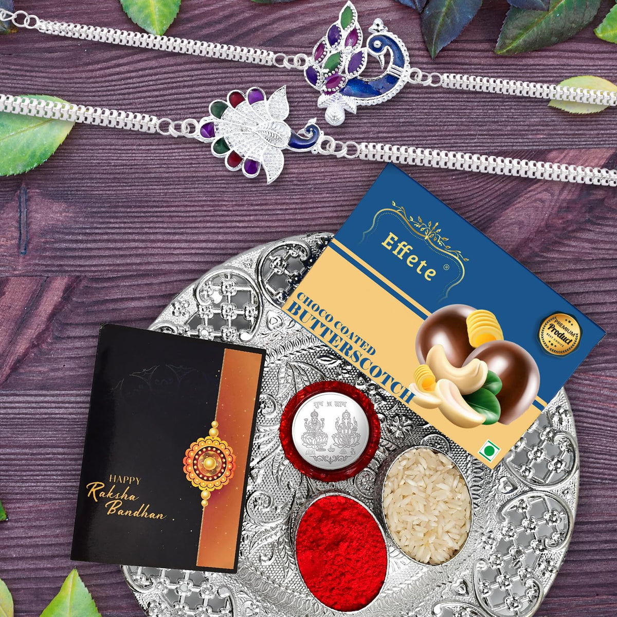 (K2_C14+C15_DS+BS32) Rakhi Combo  Chocolate Butter Scotch 32gm & Silver Pooja Thali with Pooja Coin & Greeting Card, | Rakhi gift set | Rakhi thali | rakhi gifts | Kids car rakhi | Rakhi with plate | rakhi thali set | rakhi with gift | rakhi