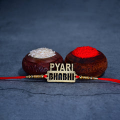 Pyari Bhabhi Design With Golden Beads With Effete Butterscotch Chocolate 96Gm ,Silver Color Pooja Coin, Roli Chawal & Greeting Card