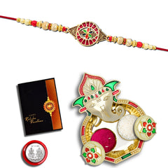 Round Traditional Rakhi With Red Mina Work With Ganesha Pooja Thali Set ,Silver Color Pooja Coin, Roli Chawal & Greeting Card