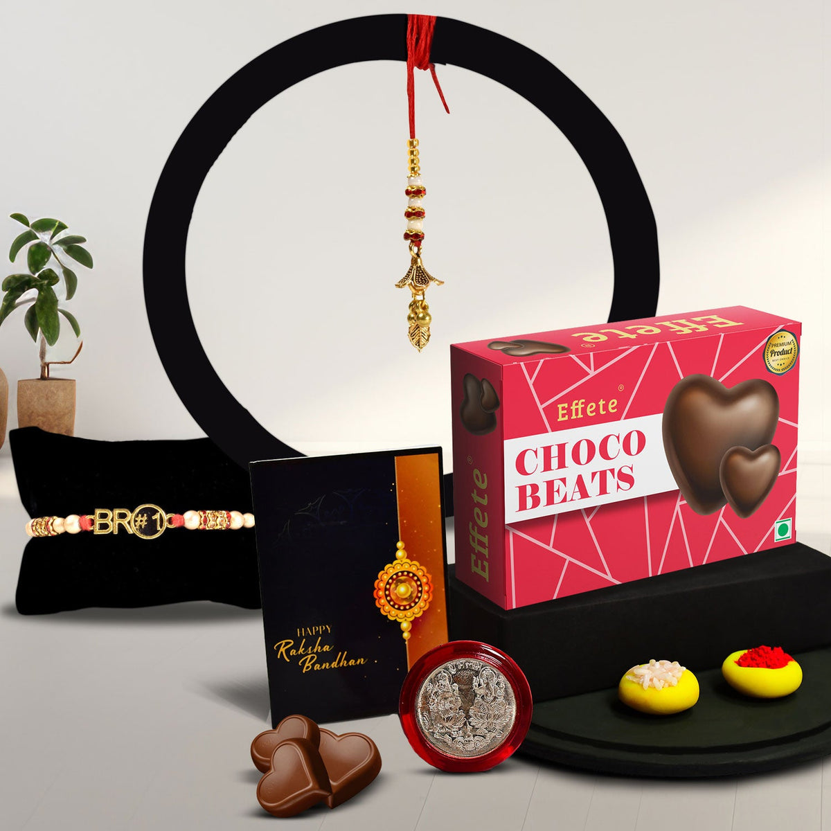 Red & Blue Mina With Diamond And Beads Rakhi With Effete Choco Beats Chocolate 32Gm ,Silver Color Pooja Coin, Roli Chawal & Greeting Card