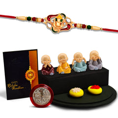 Ganesha With Green And Red Mina Rakhi With Decorative Baby Buddha Gift ,Silver Color Pooja Coin, Roli Chawal & Greeting Card