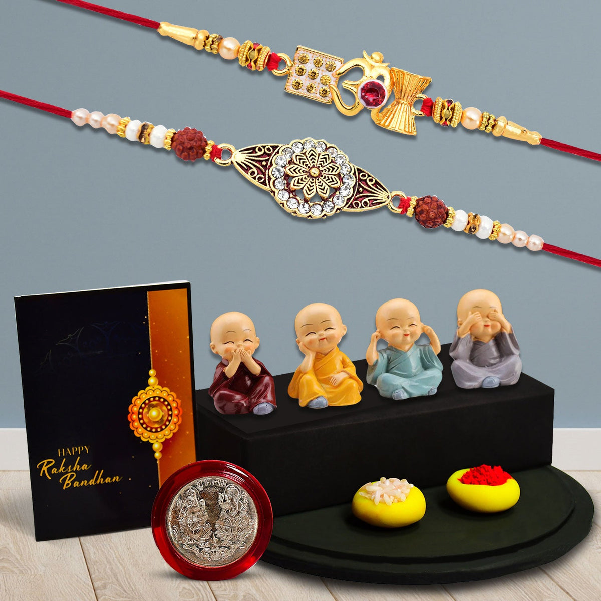 Om Rakhi With Diamond And Traditional Rakhi In Round Shape With Decorative Baby Buddha Gift ,Silver Color Pooja Coin, Roli Chawal & Greeting Card