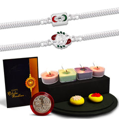 Traditional Square And Ganesh Mina Silver Color Rakhi With Decorative Gift 4Pc Diya Set ,Silver Color Pooja Coin, Roli Chawal & Greeting Card